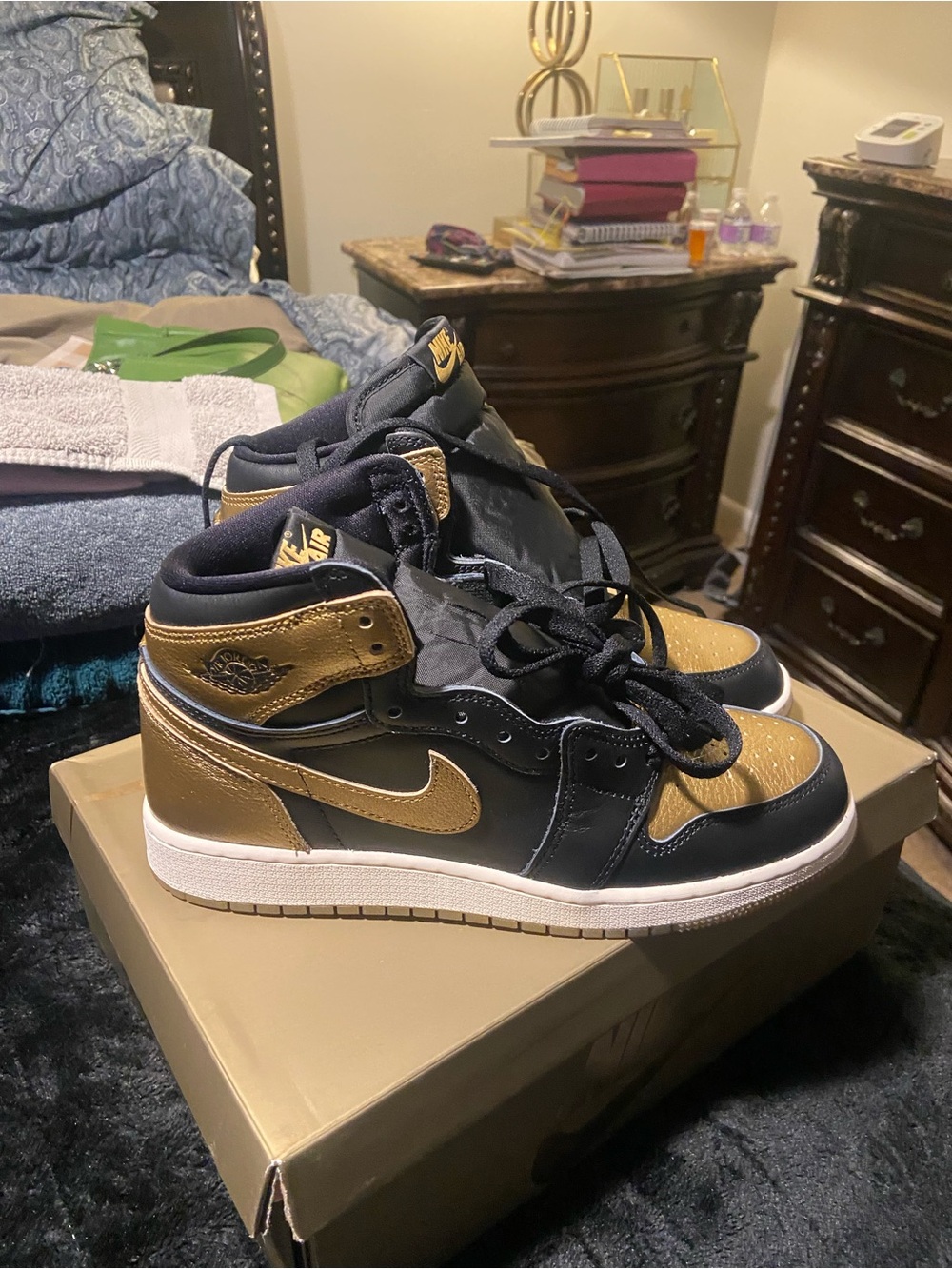 Nike Air Jordan 1 Mid Black & Metallic Gold Sneakers